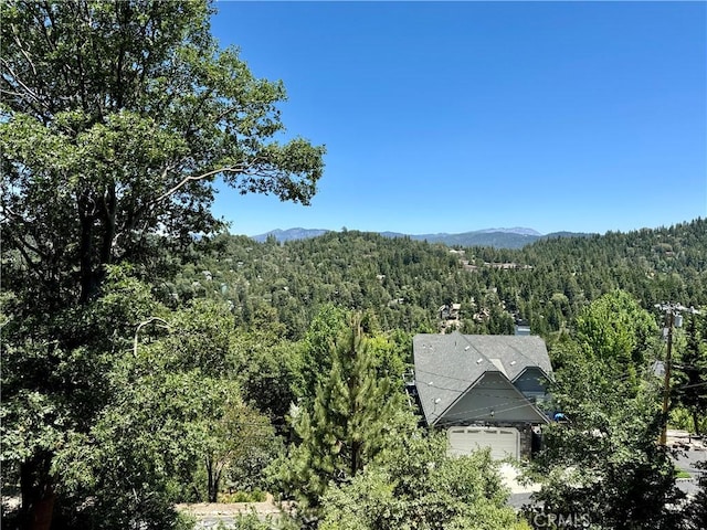 905 Madera Ln, Lake Arrowhead, CA 92352 - view of mountain backdrop featuring a heavily wooded area