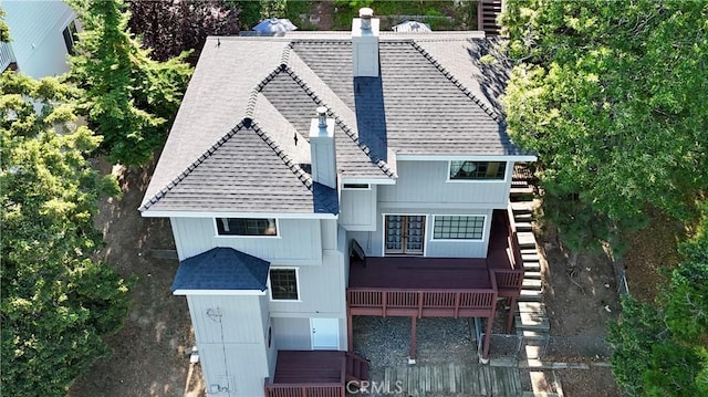 905 Madera Ln, Lake Arrowhead, CA 92352 - view of front facade featuring a chimney, roof with shingles, and stairs