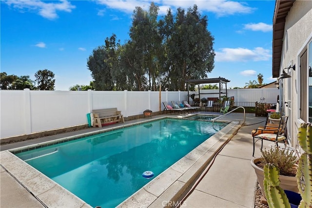 view of swimming pool featuring a pergola and a patio