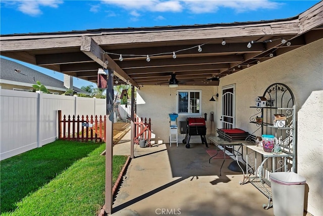 view of patio / terrace featuring ceiling fan