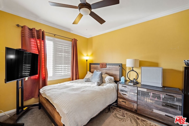 bedroom featuring ceiling fan, carpet, and crown molding