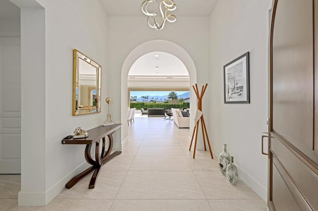 hallway featuring light tile patterned flooring