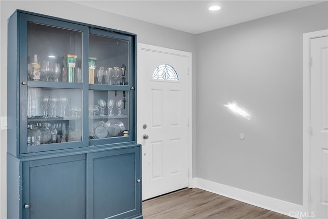 entrance foyer featuring hardwood / wood-style flooring