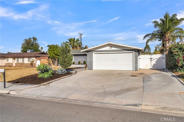 ranch-style home featuring a garage