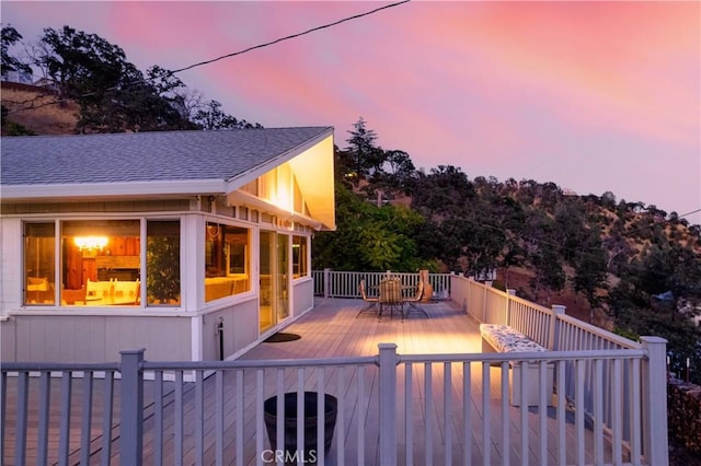 exterior space featuring a sunroom