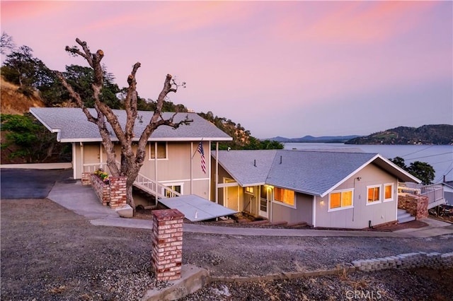 view of front of property with a mountain view