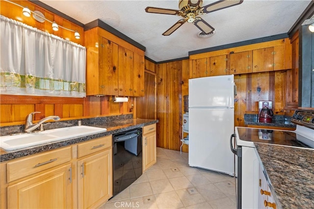 kitchen with wood walls, electric range, dishwasher, white refrigerator, and sink