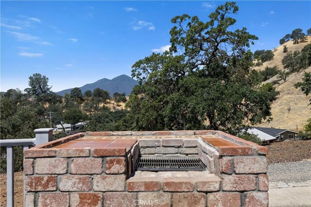 exterior space featuring a mountain view