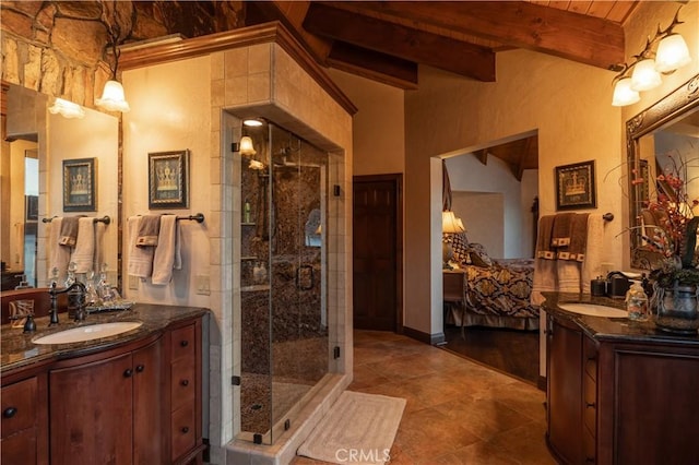 bathroom featuring walk in shower, vanity, and lofted ceiling with beams