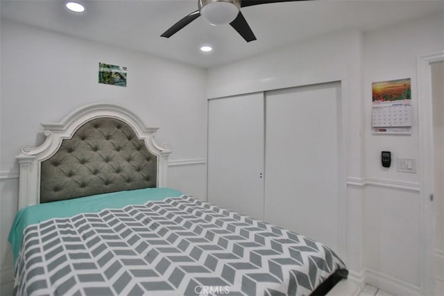 bedroom with a closet and ceiling fan