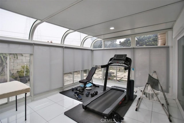 exercise area with light tile patterned flooring