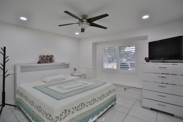 bedroom featuring ceiling fan and light tile patterned floors