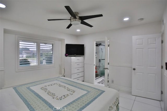 tiled bedroom featuring ceiling fan