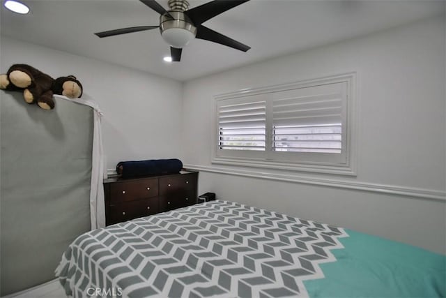 bedroom featuring ceiling fan