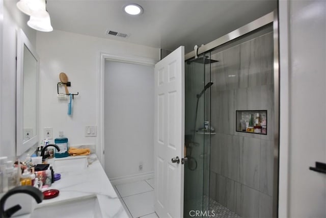 bathroom with vanity, tile patterned floors, and an enclosed shower