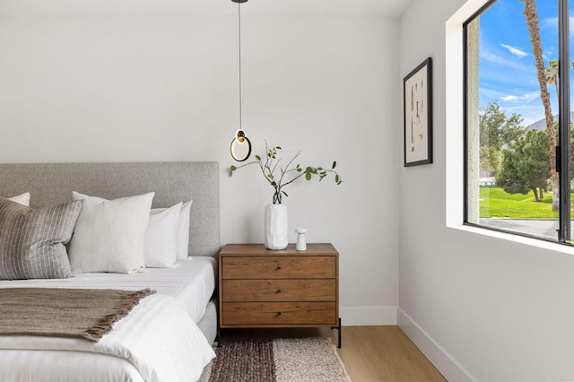 bedroom featuring hardwood / wood-style floors