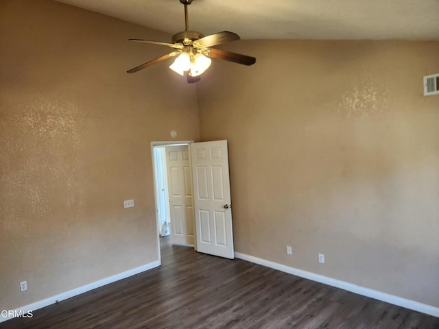 spare room featuring ceiling fan and dark hardwood / wood-style floors