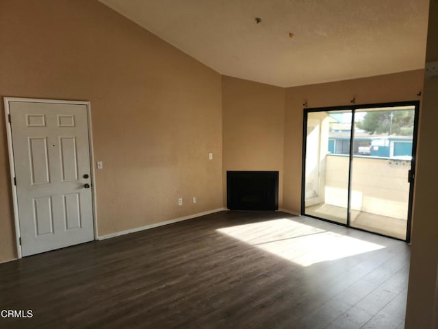 spare room featuring dark hardwood / wood-style flooring