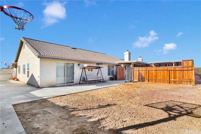 back of house featuring a patio