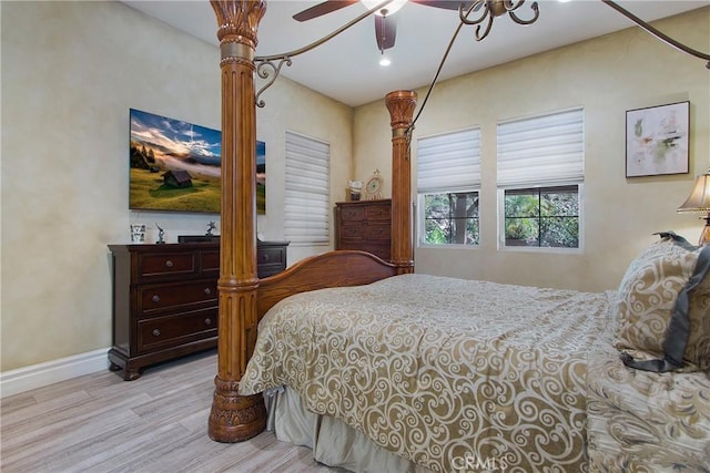 bedroom featuring ceiling fan and light hardwood / wood-style floors