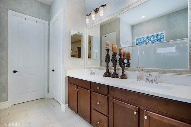 bathroom featuring vanity and tile patterned flooring