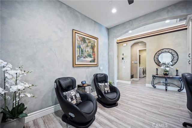 24368 Overlook Dr, Corona, CA 92883 - sitting room featuring recessed lighting, arched walkways, baseboards, and light wood-type flooring