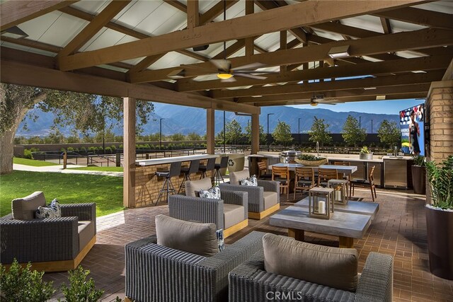 24368 Overlook Dr, Corona, CA 92883 - view of patio / terrace featuring an outdoor hangout area, outdoor dry bar, a mountain view, and a ceiling fan