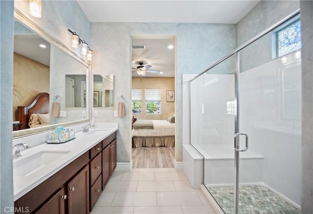 24368 Overlook Dr, Corona, CA 92883 - ensuite bathroom featuring connected bathroom, a sink, a ceiling fan, a shower stall, and visible vents