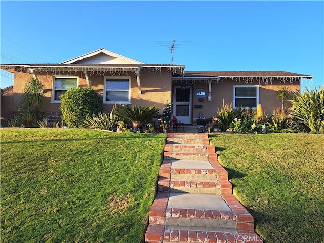 view of front of house with a front yard