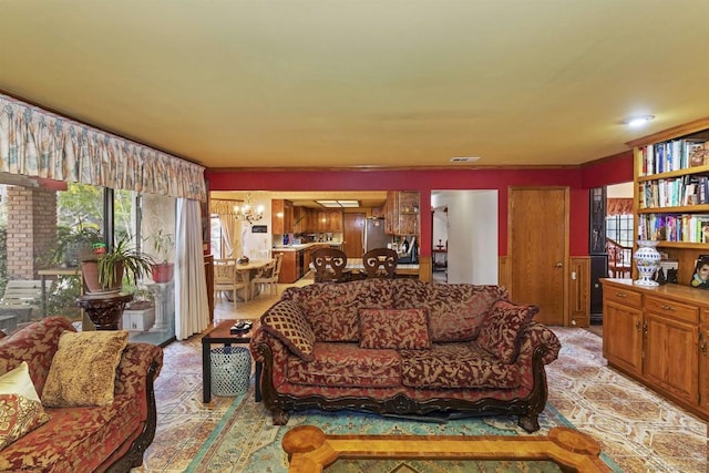 living room featuring a chandelier