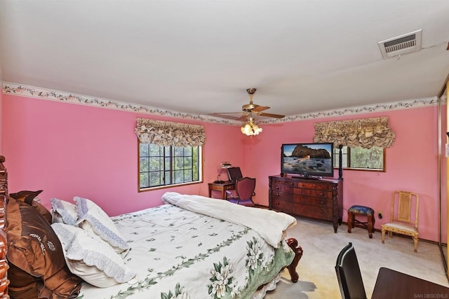 carpeted bedroom featuring ceiling fan