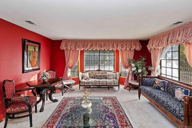 living room with light colored carpet