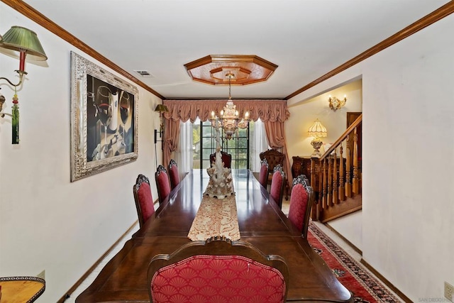 dining space featuring an inviting chandelier and crown molding