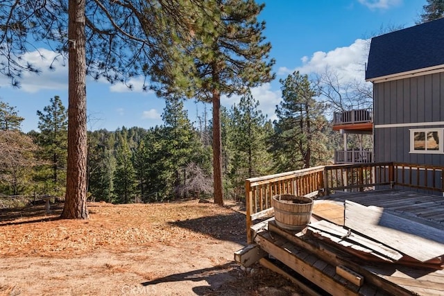 view of yard featuring a wooden deck