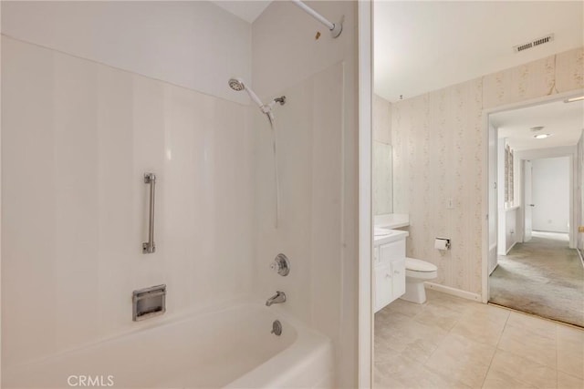 full bathroom with toilet, tile patterned floors, vanity, and shower / bathing tub combination