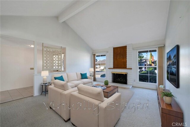 living room featuring light carpet, beam ceiling, a fireplace, and high vaulted ceiling