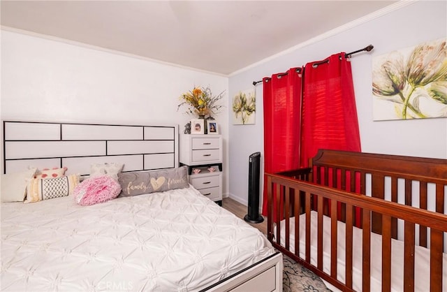 bedroom with ornamental molding