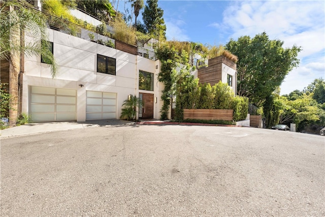 modern home featuring a garage