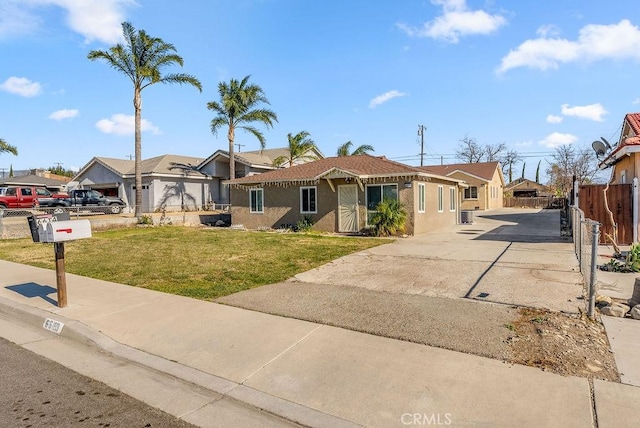 view of front of home with a front lawn