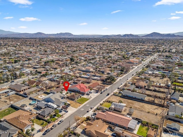 drone / aerial view featuring a mountain view