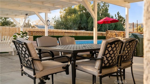 view of patio / terrace featuring a fenced in pool