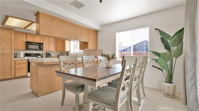 view of tiled dining area