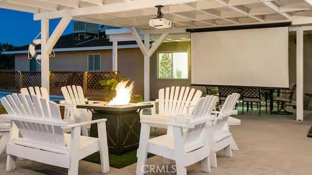 exterior space featuring an outdoor bar and an outdoor fire pit