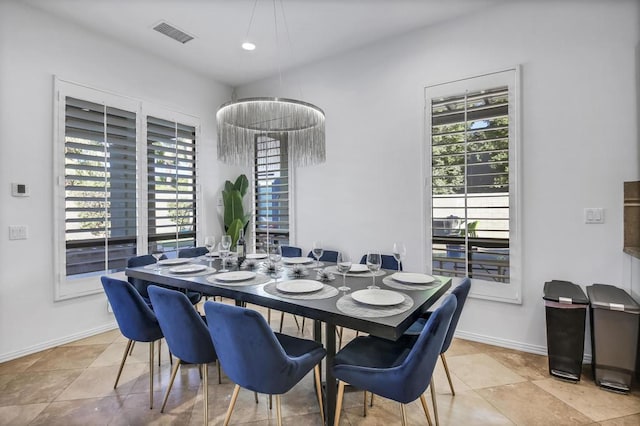 dining room featuring light tile patterned floors