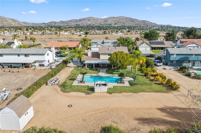 drone / aerial view featuring a mountain view