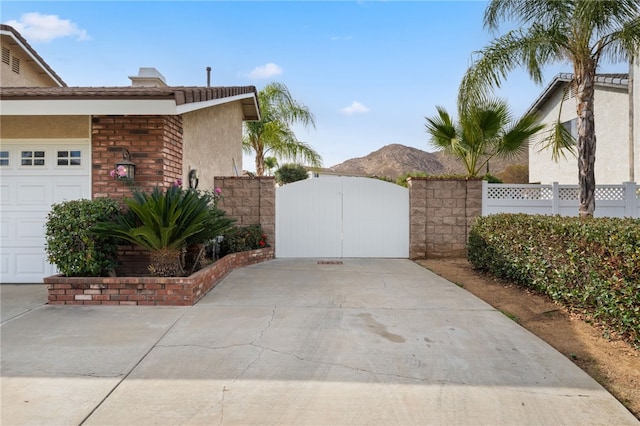 view of side of property with a mountain view