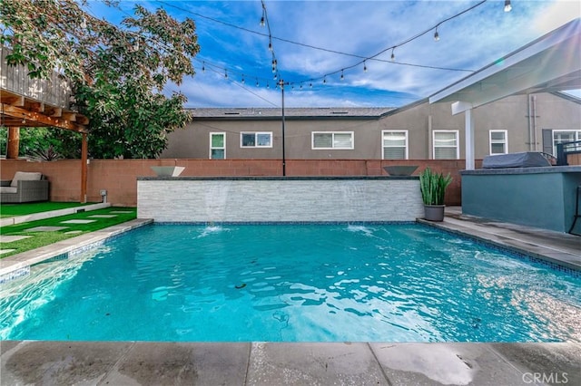 view of swimming pool featuring pool water feature