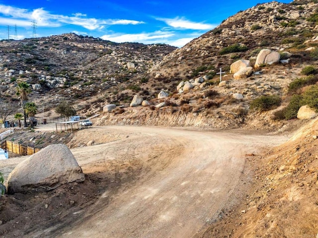 birds eye view of property with a mountain view