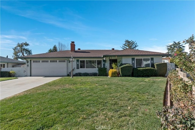 ranch-style home with a garage and a front yard