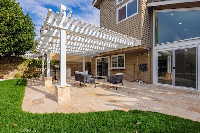 view of patio / terrace featuring an outdoor kitchen, an outdoor hangout area, and a pergola